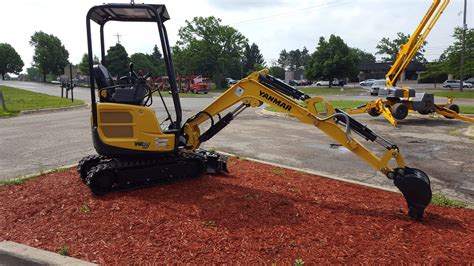 mini excavator swing boom|angle blade for mini excavator.